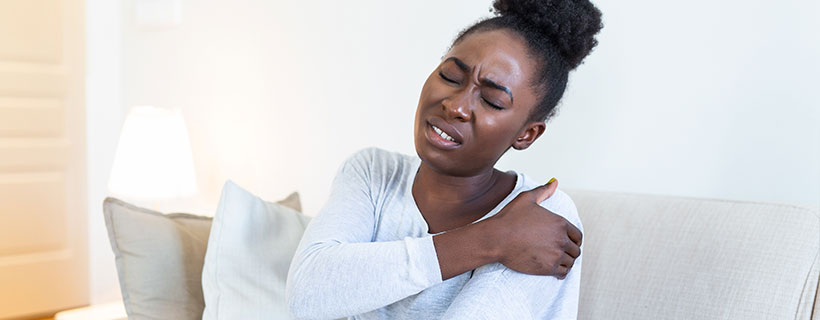 patient needing shoulder pain chiropractor in Addison TX